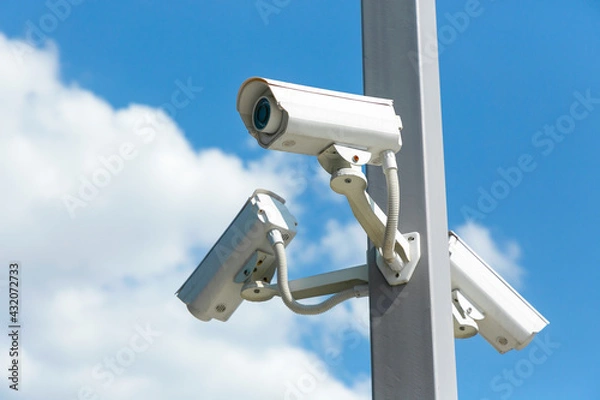 Fototapeta IP CCTV camera. Concept of surveillance and monitoring camera with parking security system concept.