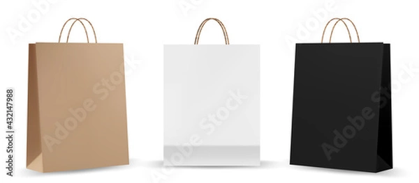 Fototapeta Shopping bag mockups. Paper package isolated on white background. Realistic mockup of craft paper bags.