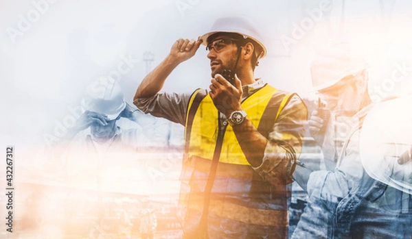 Obraz Double exposure of engineer caucasian man using walkie-talkie talking in the work site, abstract design.