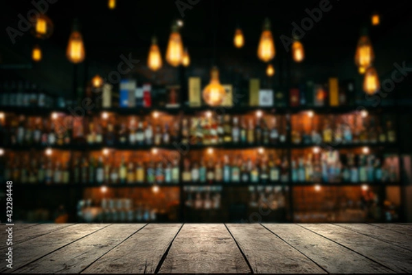 Fototapeta Wooden table with Blurred liquor bar background	