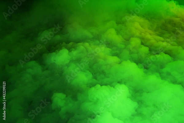 Fototapeta Thick green smoke. The green smoke from the bomb explosions appears as a cloud background.