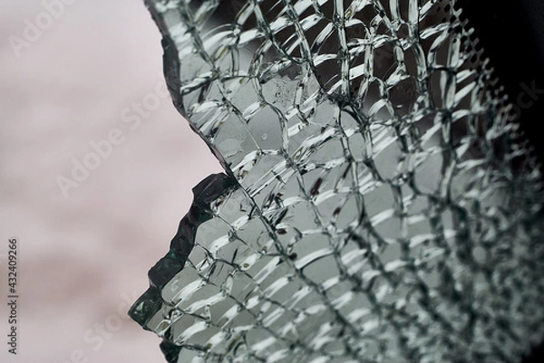 Fototapeta A Shattered Side Window of a Broken Car