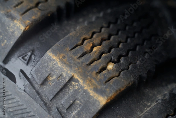 Fototapeta An Old and Rusty Tyre of a Car