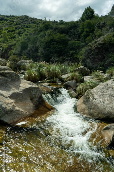 Obraz small beautiful waterfall among the rocks
