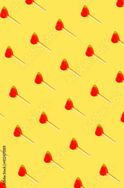 Fototapeta Creative flat lay composition with lollipops. Colorful background idea.