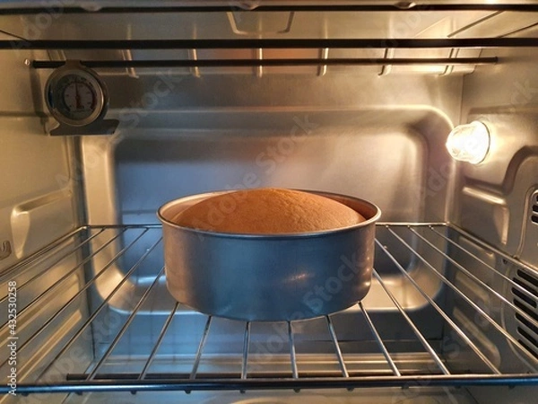 Obraz Bake bread in a heat oven.