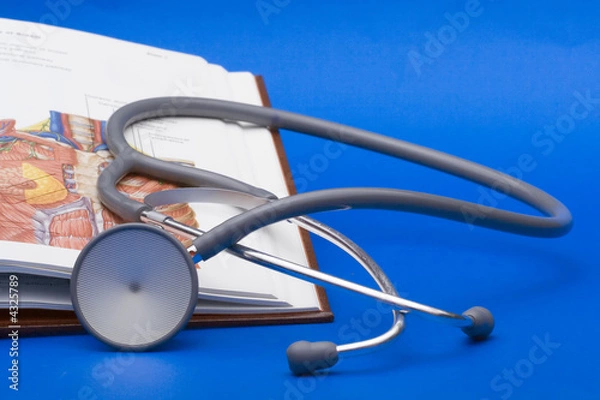 Fototapeta Stethoscope on a book