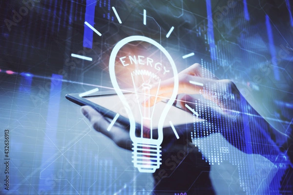 Fototapeta Double exposure of light bulb hologram and woman holding and using a mobile device. Idea concept.