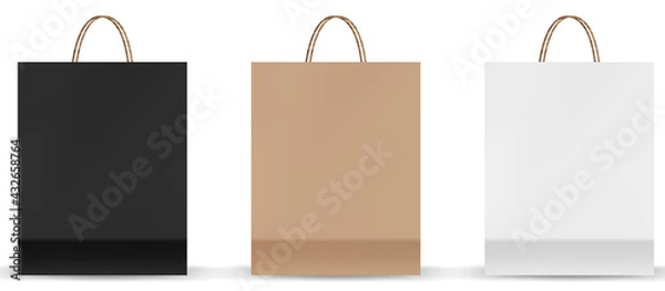 Fototapeta Shopping bag mockups. Paper package isolated on white background. Realistic mockup of craft paper bags.