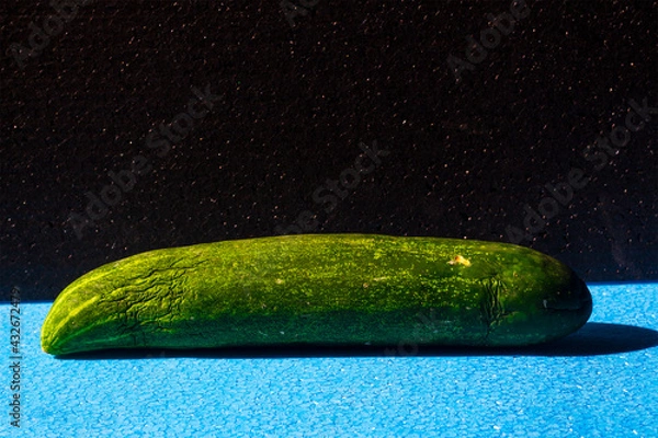 Fototapeta cucumber on a black background