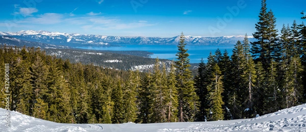 Fototapeta Panoramic view of the Sierra Nevada Mountains of California with Lake Tahoe in the background, from the (Olympic)  Valley Ski Resort, between Truckee and Tahoe City.