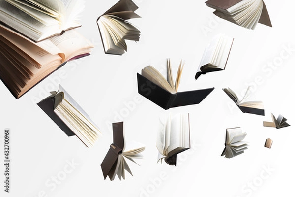 Fototapeta Flying several books isolated on white background.