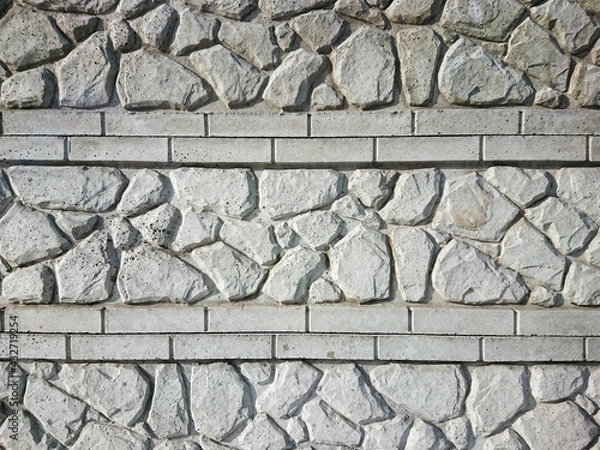 Obraz Stone fence texture - a feature of the building.