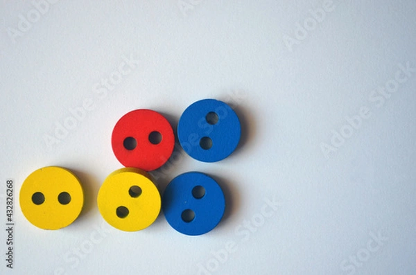 Obraz Multi-colored buttons on a white background.