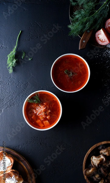 Obraz red soup in a white plate