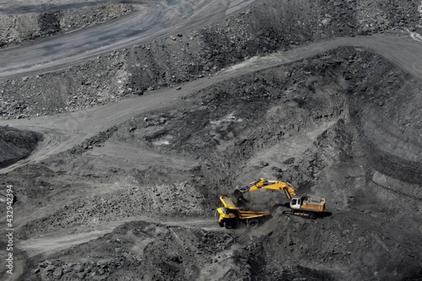 Fototapeta Machines working in open pit coal mine