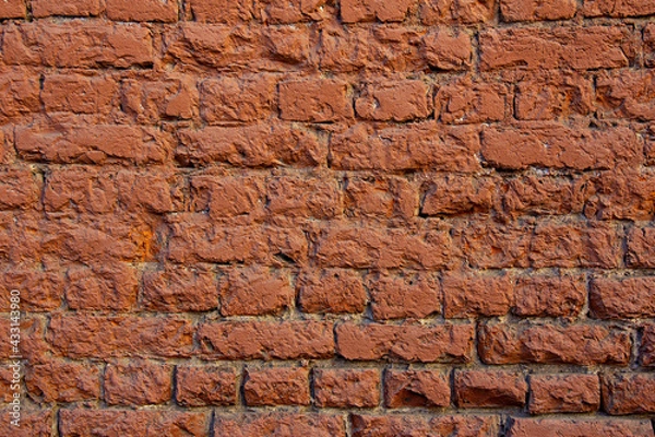 Fototapeta Old weather-beaten grunge red brick wall background 