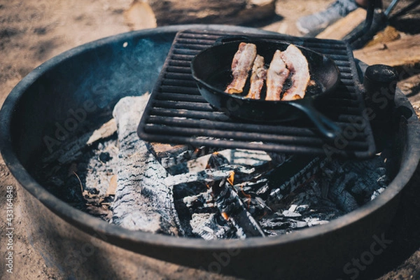 Fototapeta bacon over campfire