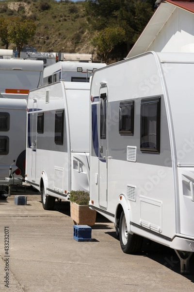 Obraz group different caravans in camping