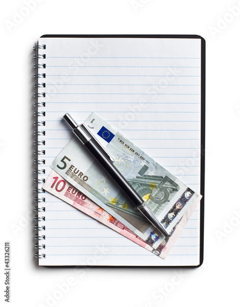 Fototapeta euro currency and pen on blank notebook