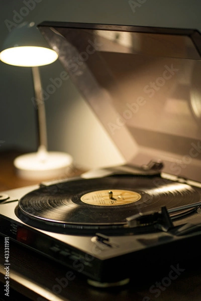 Obraz vinyl player with warm backlighting