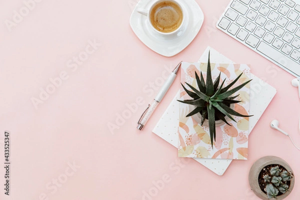 Obraz Top view woman office desk and supplies, coffee cup, keyboard with copy space. Creative flat lay photo of workspace desk, blogger concept