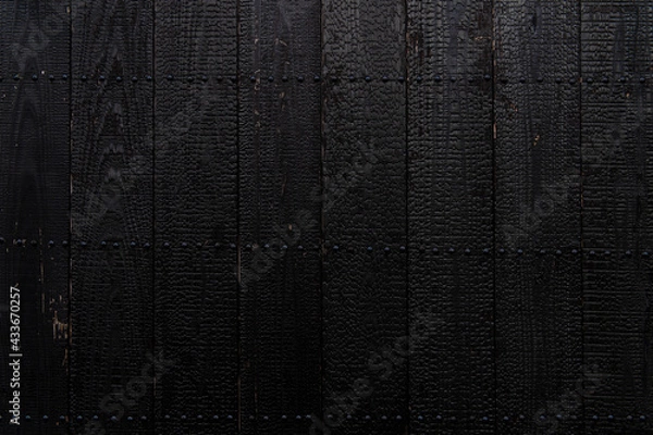 Obraz 黒い焼杉を用いた木造建築の壁面