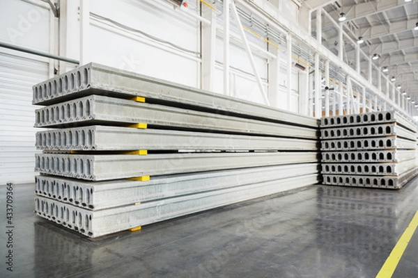 Obraz Stack of precast reinforced concrete slabs in factory workshop
