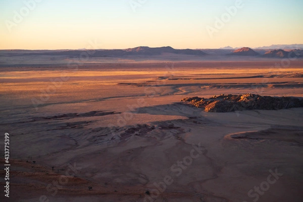 Obraz In the arid area of the world, the scenery of the Taklimakan Desert in Xinjiang, China, with a detailed background image of the desert Gobi.