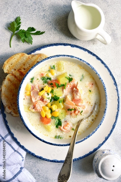 Fototapeta Chowder - thick potato soup with trout ( salmon ) and cream. Top view with copy space.