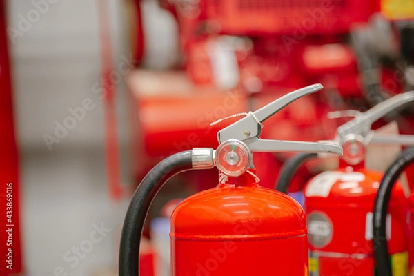 Fototapeta Inspection Fire extinguisher and fire hose,Ready to use in the event of a fire.Safety first concept.