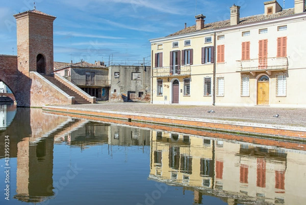 Fototapeta 
Comacchio, Italy - often compared to Venice for the canals and the architecture, Comacchio displays one of the most characteristic old towns in Emilia Romagna