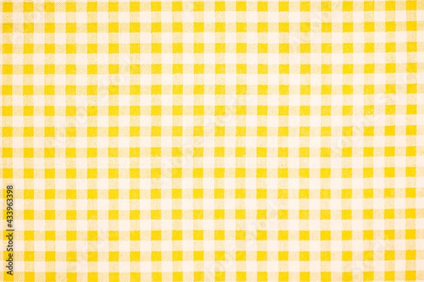 Fototapeta Gingham pattern in yellow and white, closed up texture of yellow and white for background. Picnic table cloth.