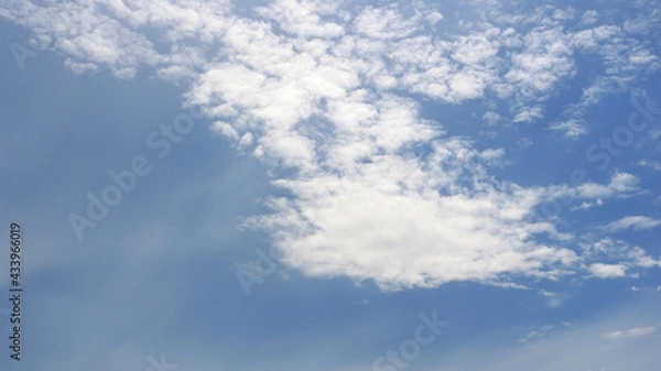 Obraz Clouds on bright blue sky background