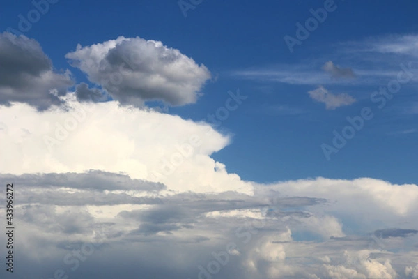 Obraz Clouds on bright blue sky background