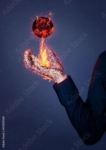 Fototapeta Hand magically burning, with floating burning ball