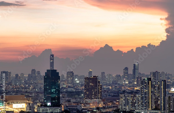 Fototapeta Bangkok, Thailand - May 09, 2021: Aerial view of Beautiful scenery view of Skyscraper Evening time Sunset creates relaxing feeling for the rest of the day. Selective focus.
