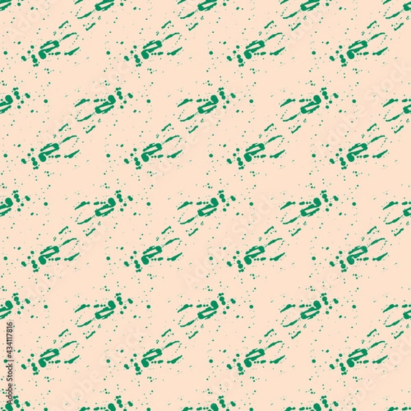 Fototapeta Seamless pattern with a pattern of green spots of paint on a beige background. Vector. Use for fabric, wallpaper, wrapping paper, napkins, diapers, backdrops.