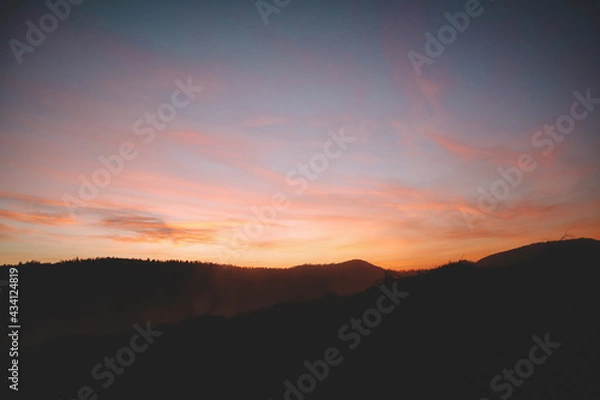 Fototapeta Sunset in the mountains. View of Mount Pikuy. Ukrainian Carpathians in spring.