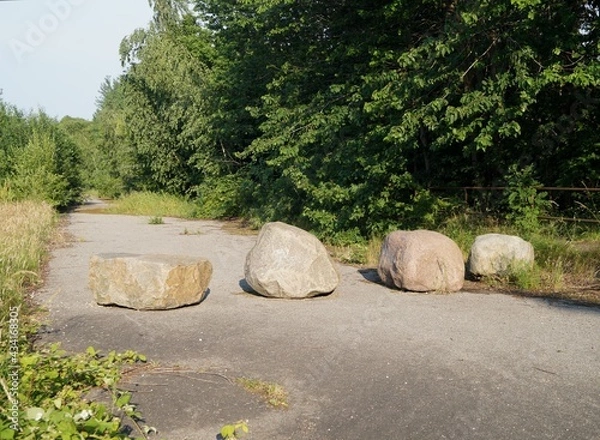 Obraz Four stones on an abandoned road 