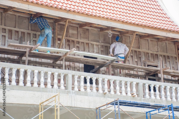Obraz construction workers on the roof