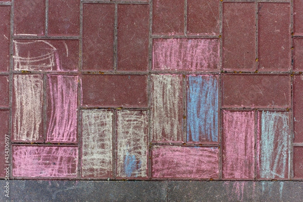 Fototapeta Color chalk colored  exterior ground tiles. Children creativity. Abstract background with copy space	