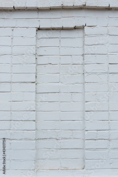 Fototapeta Close-up of architectural element of old Russian monastery building. Niche in the white painted brick wall of church. Kostroma, Golden Ring, Russia.