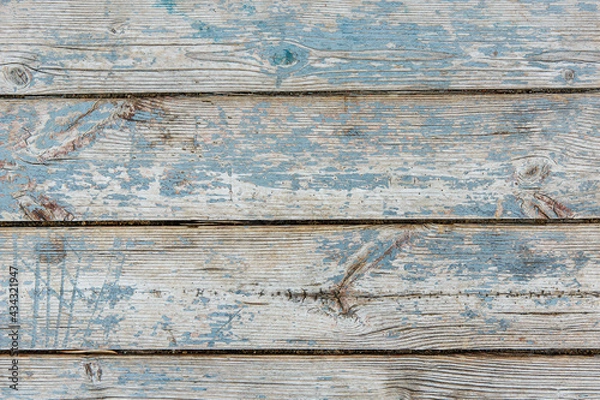 Fototapeta Aged light blue painted wood texture background. Old vintage wood board painted with blue paint. Weathered colored wooden planks of wall, fence, table or floor with copy space