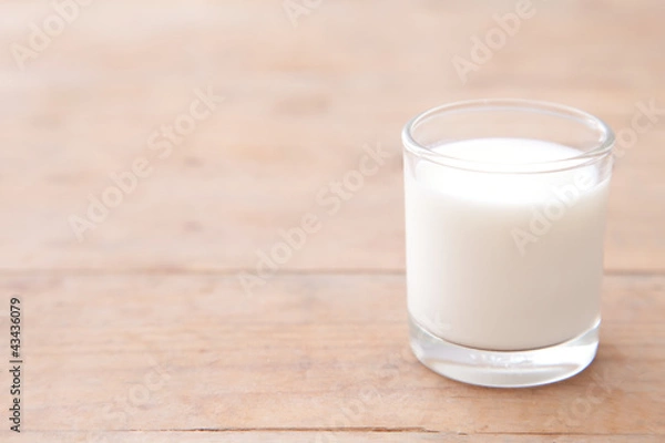 Obraz Milk on wood table background