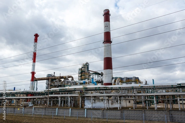 Fototapeta View of oil and gas refinery plant in Yaroslavl region. Petrochemical and chemical distillation process constructions and production communications.  Gasoline, petroleum, petrol production