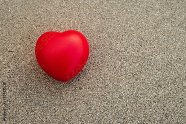 Obraz Red heart symbol of love on a rough stone surface. Abstract Saint Valentine background.