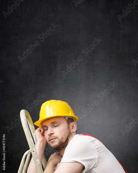 Obraz Portrait of a lazy worker with ladder