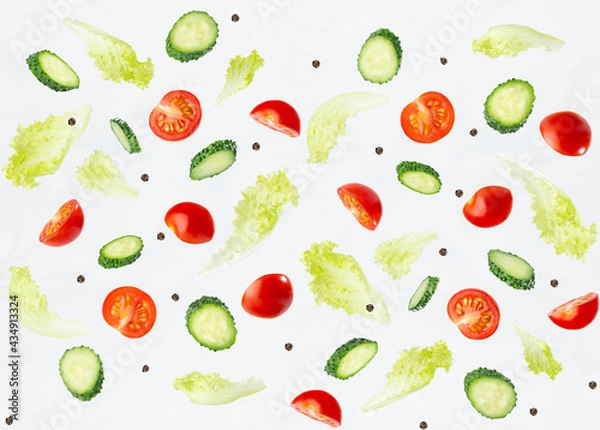 Fototapeta Wellness seamless food pattern - slices cherry tomato, cucumber and green salad as flying levitate flow on white background.