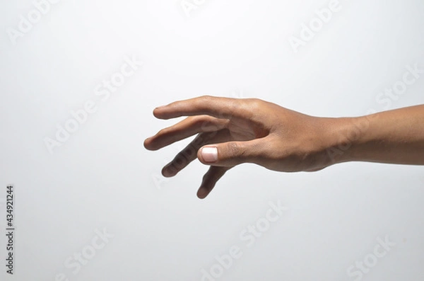 Fototapeta close-up male hand try to reaching something